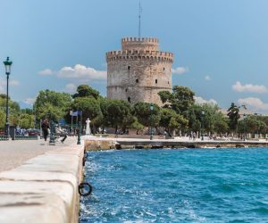 a-seafront-promenade-in-thessaloniki-with-a-byzantine-heritage-white-tower-behind-trees